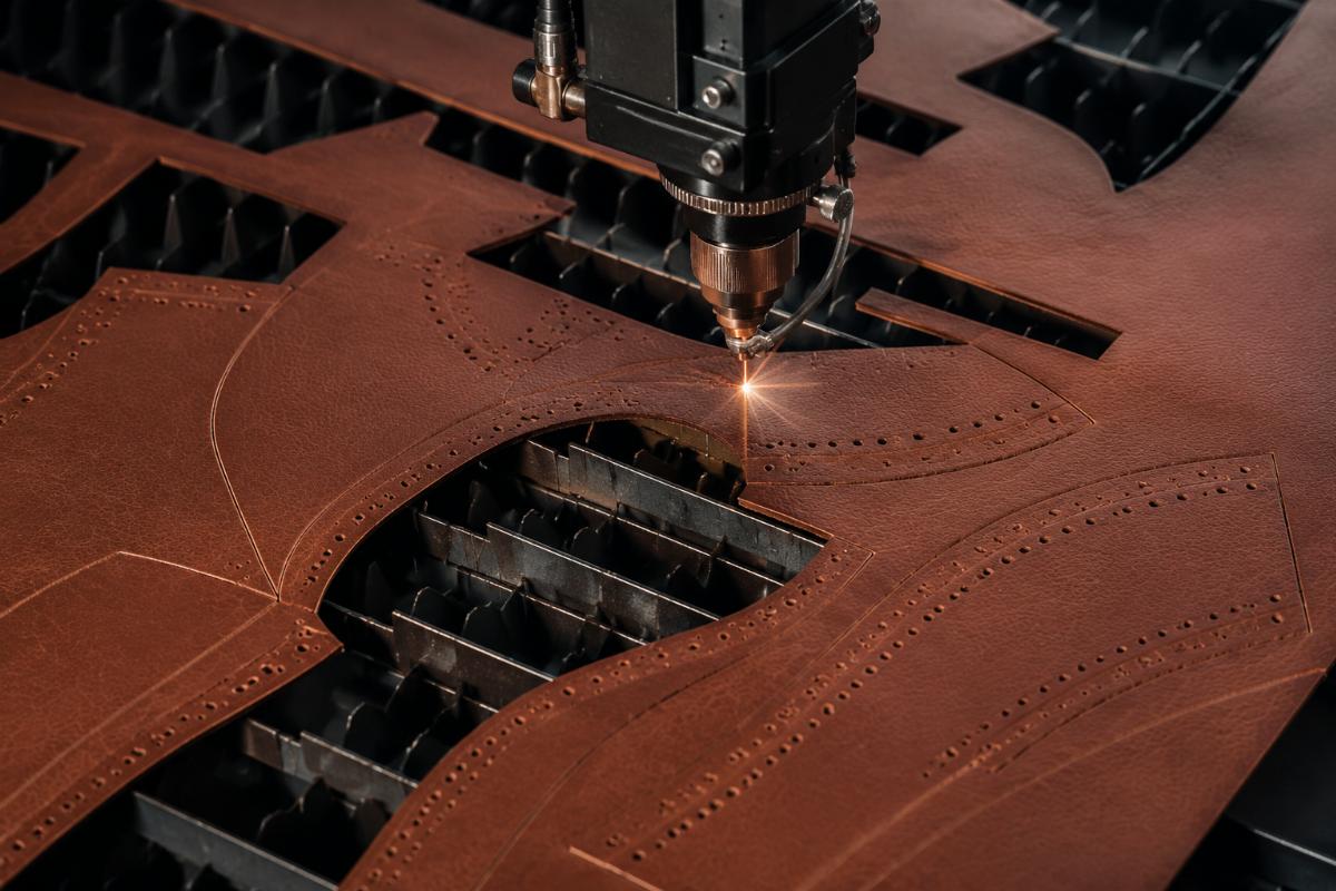 Precision 0.1mm cutting on full-grain leather for custom shoe production Close-up of precision cut shoe components with clean, unburnt edges